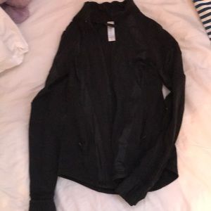 Black Ivivva athletic jacket.